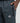 dark blue track pants with a zippered side pocket and a hex badge logo.