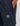 navy blue track pants with a black zip pocket and a hexagonal patch reading k star originals