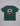 green short sleeve t shirt with white and orange circular logo on the chest and a small brand patch at the lower hem