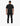 Back view of a male model wearing a black Been Mens T-Shirt and black jeans, standing on a white background.