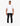Full-body shot of a male model wearing a white Benedict men's t-shirt with a checkered pocket and black jeans.