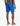 Cobra Mens Swimshorts in a vibrant blue color, featuring a subtle snakeskin pattern, showcased from a back view on a model.