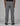 back view of grey tactical cargo trousers with rear pockets, zip side pockets and a small brand patch at the waist