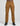tan cargo trousers with side zip pockets, belt loops, and drawstring cuffs worn with black shoes