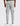 back view of light grey track pants with cargo pockets and cuffed ankles, brand badge on back pocket, worn with white