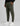 olive green track pants with zip pocket and hex logo patch, shown with white sneakers