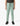 Mint green Ghost Boys V2.0 Trackpants with black zippered pockets and ankle cuffs, featuring a drawstring waist and brand