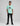 boy wearing mint green short sleeve graphic t shirt with splash circle and peace hand design, paired with black jeans and