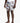 Simjee Mens Swimshorts in dark blue featuring a vibrant, abstract banana pattern in shades of orange, light blue, and white.