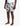 Simjee Mens Swimshorts in dark blue featuring a vibrant, abstract banana pattern in shades of orange, light blue, and white.