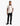 A young boy wears a cream Tito polo shirt with diverse embroidered patches, black pants, and black sneakers.