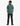 Young boy from the back wearing a green Tito polo shirt, black jeans, and black sneakers on a white background.