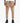 Tan Vello mens cargo style trackpants featuring multiple zipped pockets and a drawstring waist, modeled by a person.