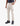 Light beige Vibe III Mens Cuffed Jogger pants featuring side cargo pockets, an elastic drawstring waist, and ribbed cuffs.